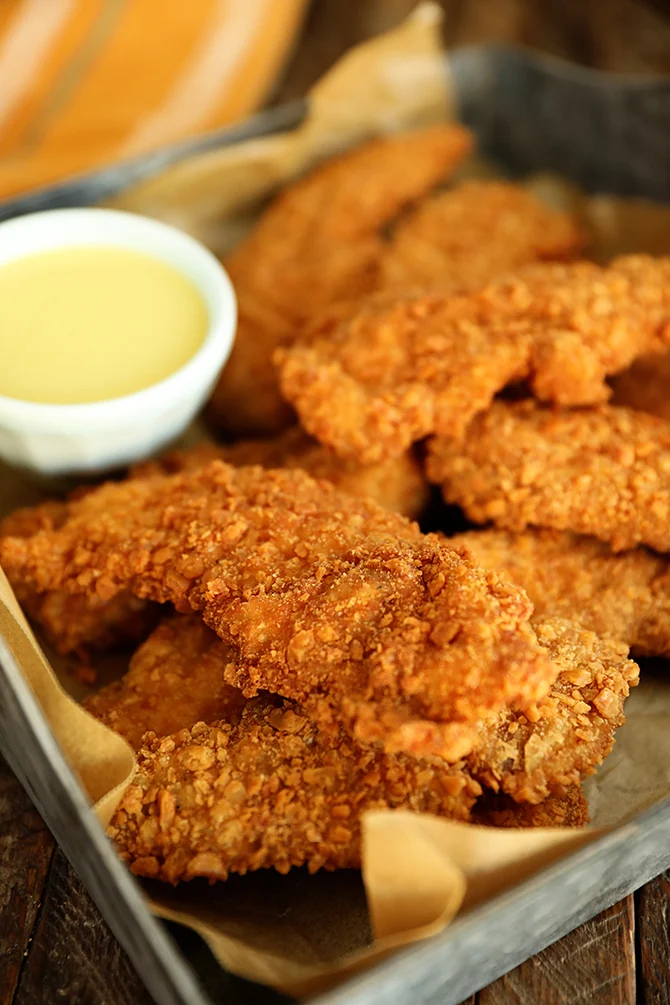 Crispy chicken tenders and fries